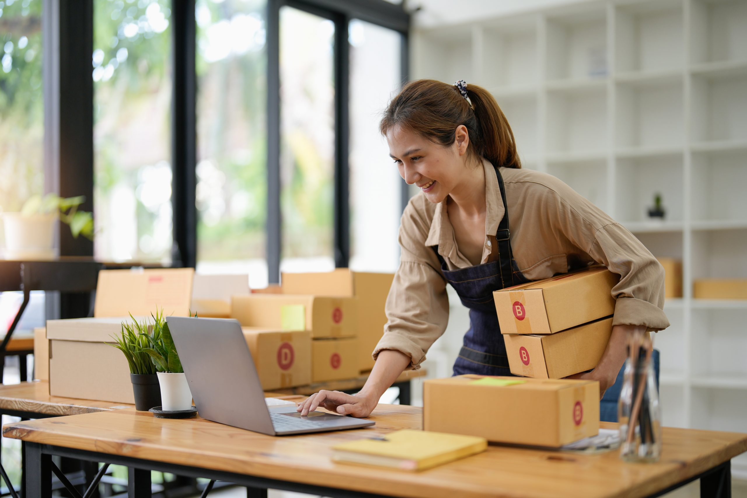 Sme Entrepreneur Small Business Entrepreneurs Online Selling Ideas,happy Young Asian Business Owner Work On Computer And A Boxs At Home,delivery Sme Procurement Package Box Deliver To Customers